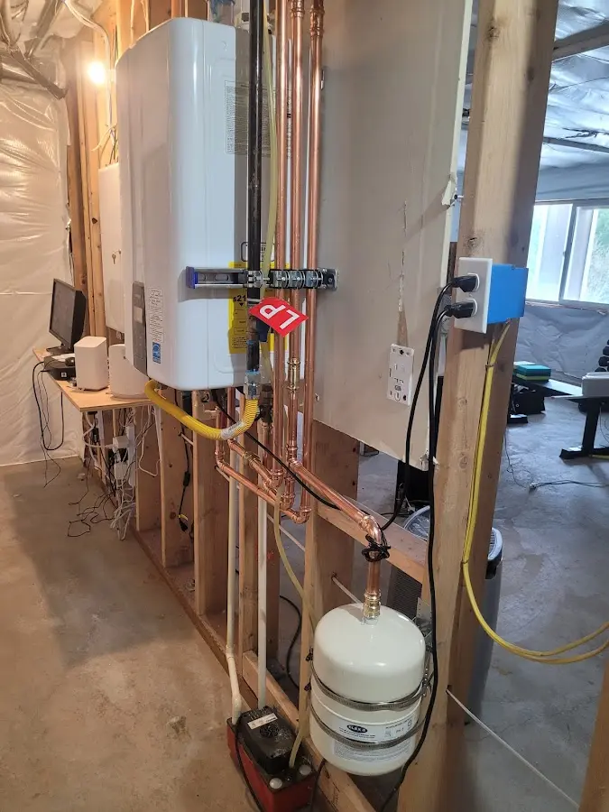 Licensed plumber repairing a kitchen sink in Oldsmar